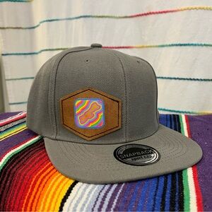 Madeline Island Flat Brim Hat - Leather Patch